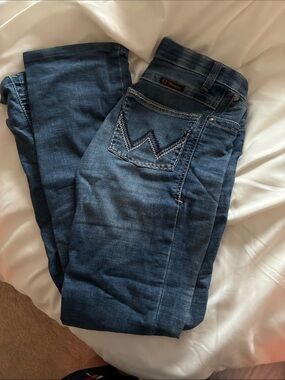Wrangler Dark Blue Straight Leg Jeans

They’ve been hemmed to a 32 inch inseam